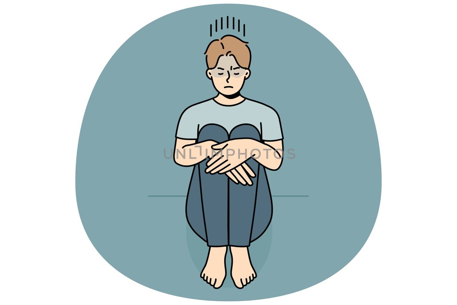 Unhappy young man sitting on floor suffer from loneliness or depression. Upset sad guy struggle from solitude or bad mood. Vector illustration.