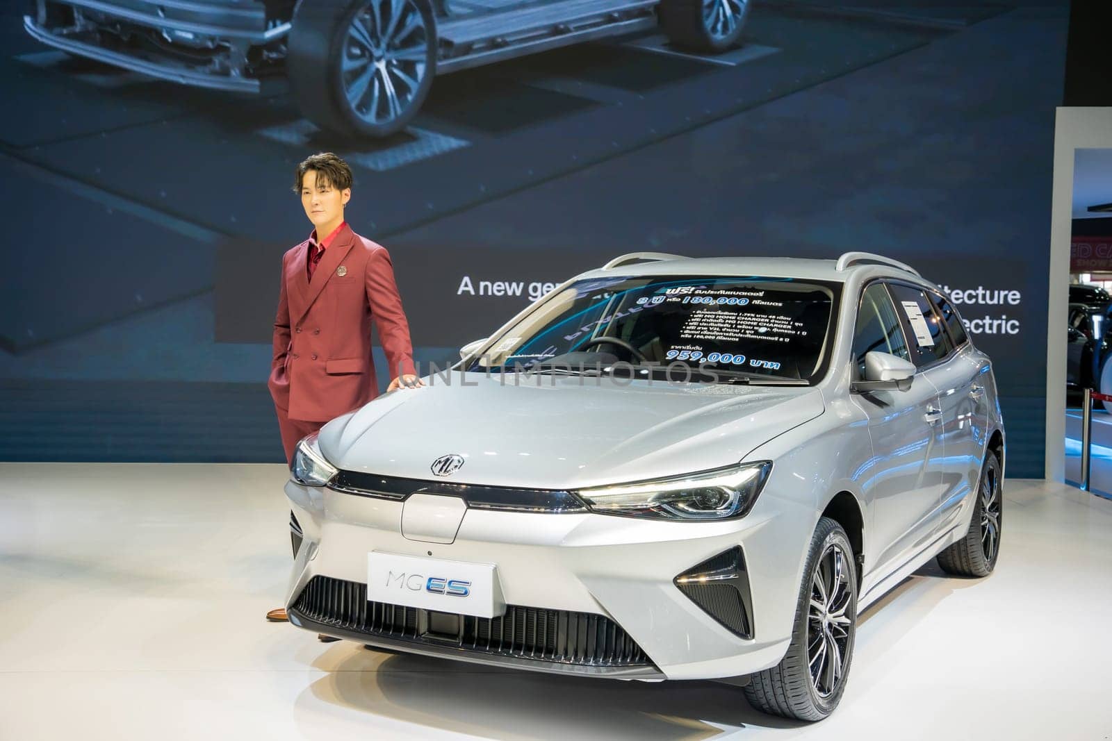 Nonthaburi, Thailand - APR 2, 2023 Unidentified model poses with a car at The 44th Bangkok international motor show 2023 at IMPACT Arena, Muang Thong Thani, Nonthaburi, Thailand.