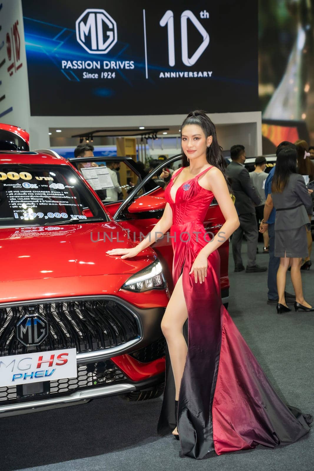 Nonthaburi, Thailand - APR 2, 2023 Unidentified model poses with a car at The 44th Bangkok international motor show 2023 at IMPACT Arena, Muang Thong Thani, Nonthaburi, Thailand.