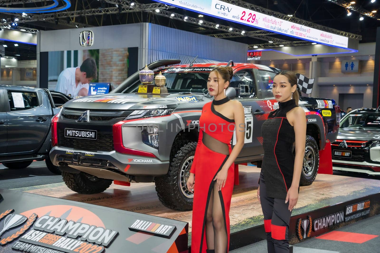 Nonthaburi, Thailand - APR 2, 2023 Unidentified model poses with a car at The 44th Bangkok international motor show 2023 at IMPACT Arena, Muang Thong Thani, Nonthaburi, Thailand.