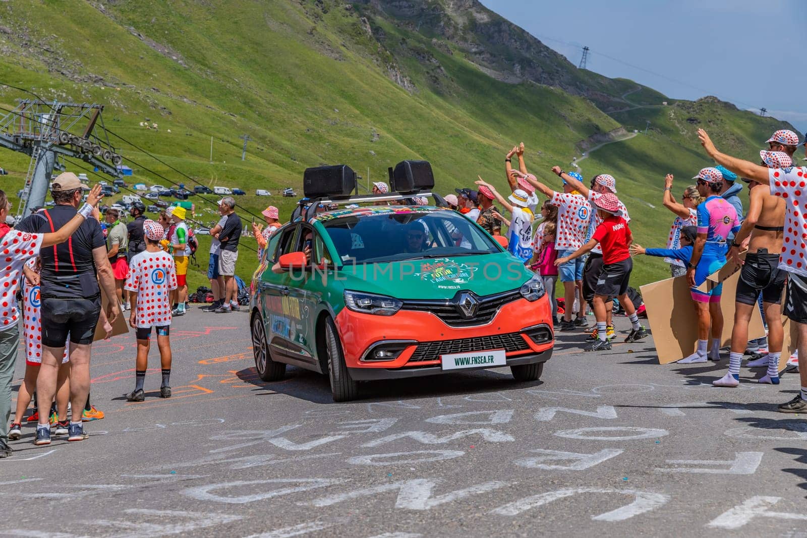 Col du Tourmalet, France - July 06 2023: Caravan car at the top of the Col du Tourmalet in Pyerenees mountains during the stage 6 of Le Tour de France 2023