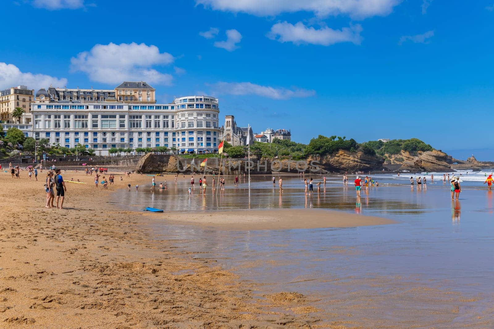 Biarritz, France, July 03, 2023: People at the Grande Plage in the French resort town of Biarritz.