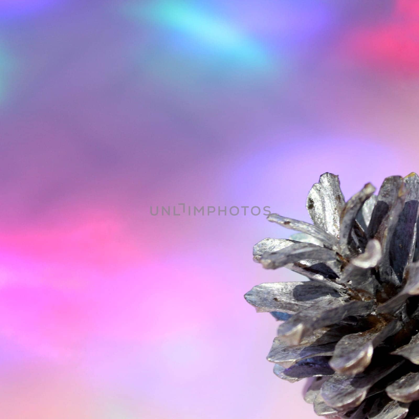 christmas balls on a background of colored lights and bokeh.