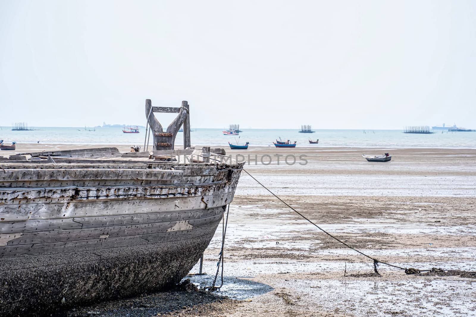 The remains of a fishing boat left on the beach.