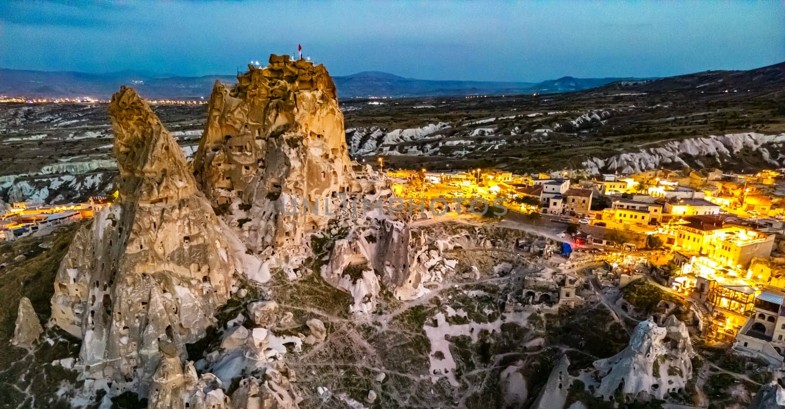View of Uchisar Castle in Nevsehir Province in Cappadocia, Turkey after sunset