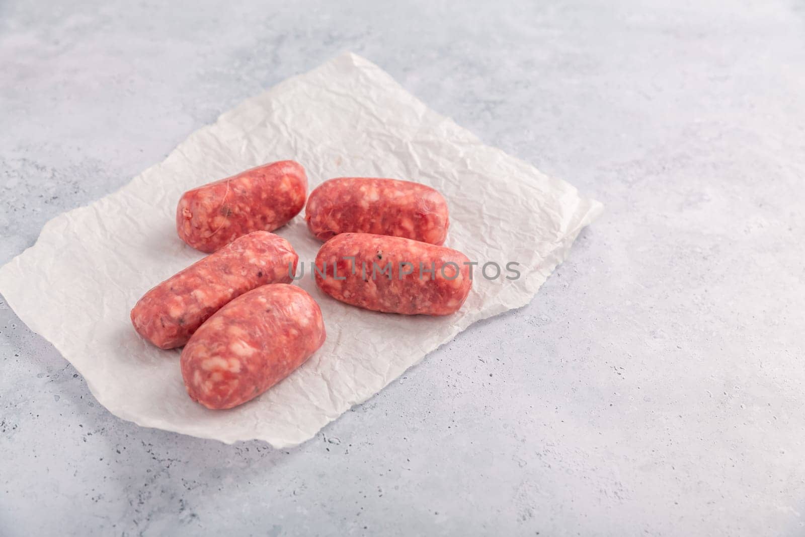 Raw Italian sausage, delicious small Salsiccia sausages with herbs