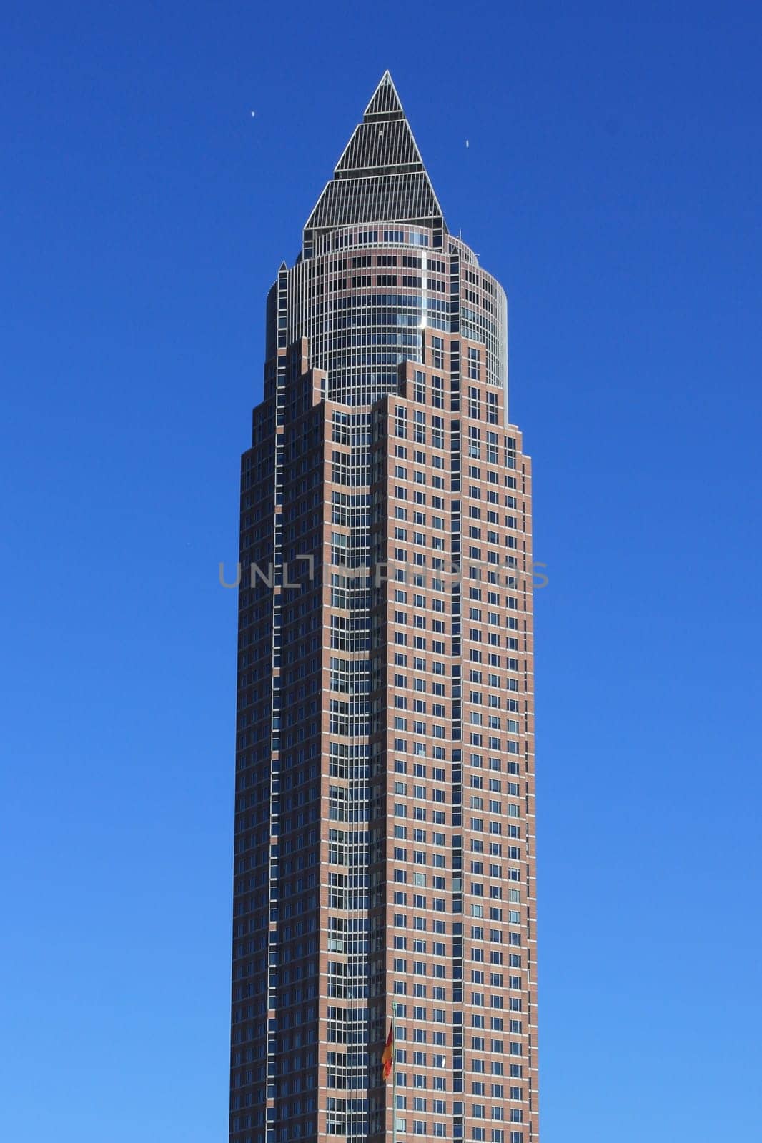 The Messeturm, or Trade Fair Tower, is a 63-storey, 257 m skyscraper in the Westend-Süd district of Frankfurt, Germany