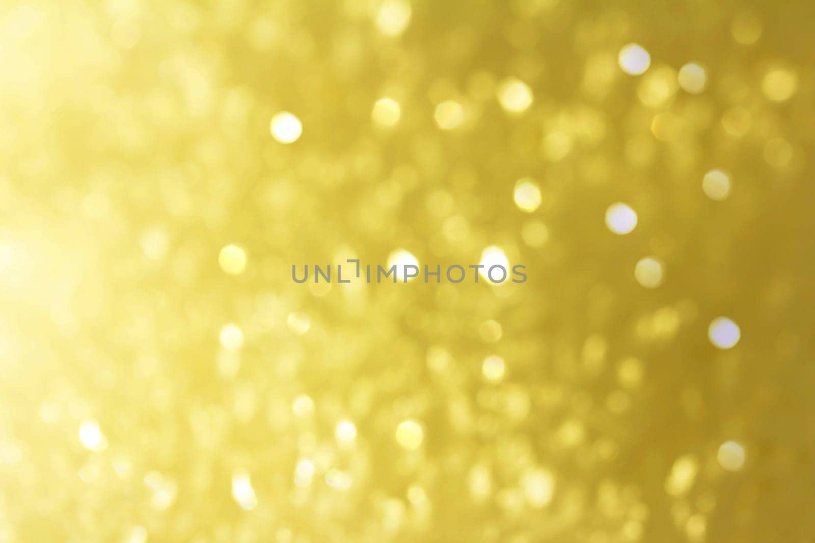 Christmas golden background with glittering snowflakes
