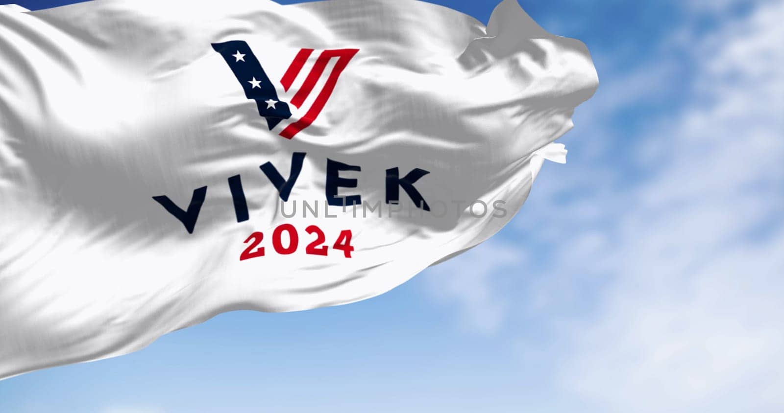 Washington D.C., US, June 21 2023: Vivek Ramaswamy 2024 presidential election campaign flag waving on a clear day. Illustrative editorial 3d illustration render.