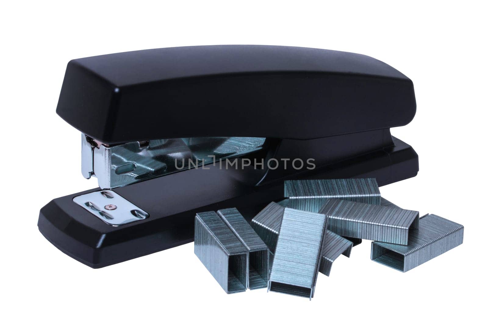 Black professional stapler with a stack of metal staples isolated on a white. Clipping path. Office supplies, stationery, sharpener and others. Office equipment. Macro.