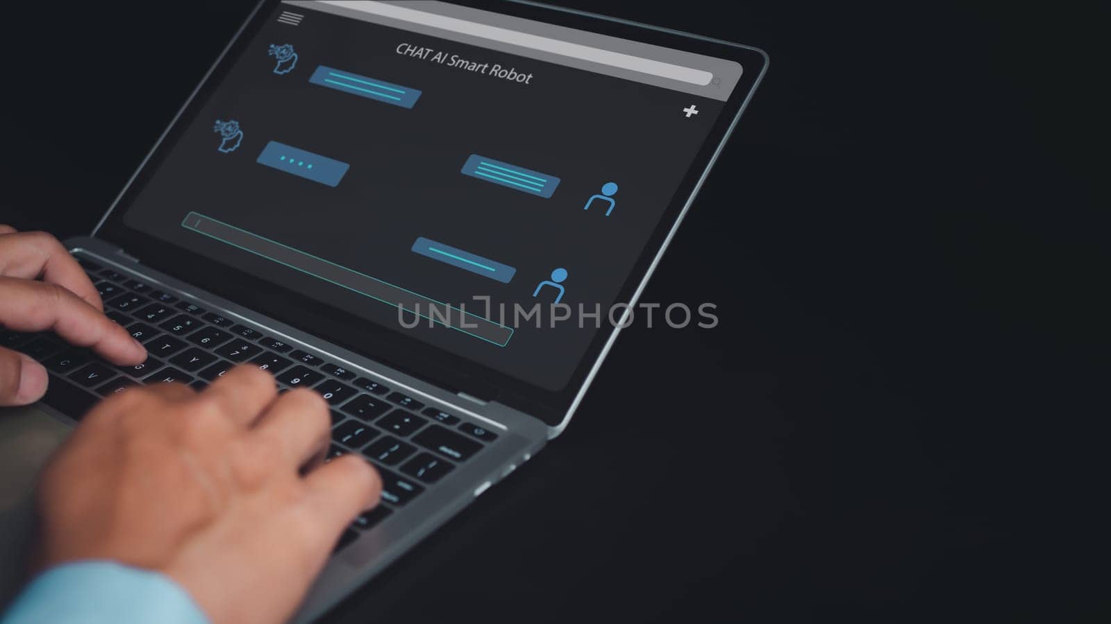 Businessman uses computer to type chat Ask and answer with the artificial intelligence system, chatbot, AI assistant.