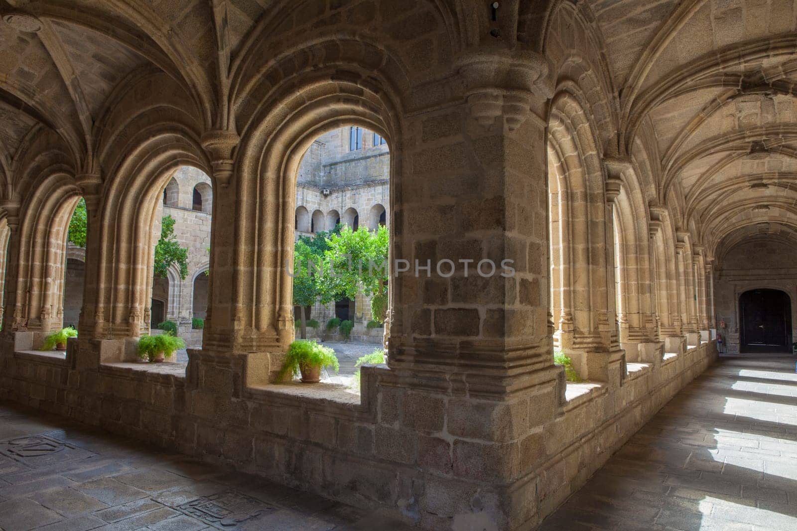 Alcantara, Spain - Oct 6th, 2022: Gothic Cloister of Convent of San Benito de Alcantara, Caceres, Spain. Former refectory