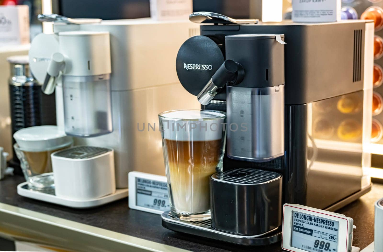 POZNAN, POL - DEC 8, 2023: Nespresso coffee makers put up for sale in a store.