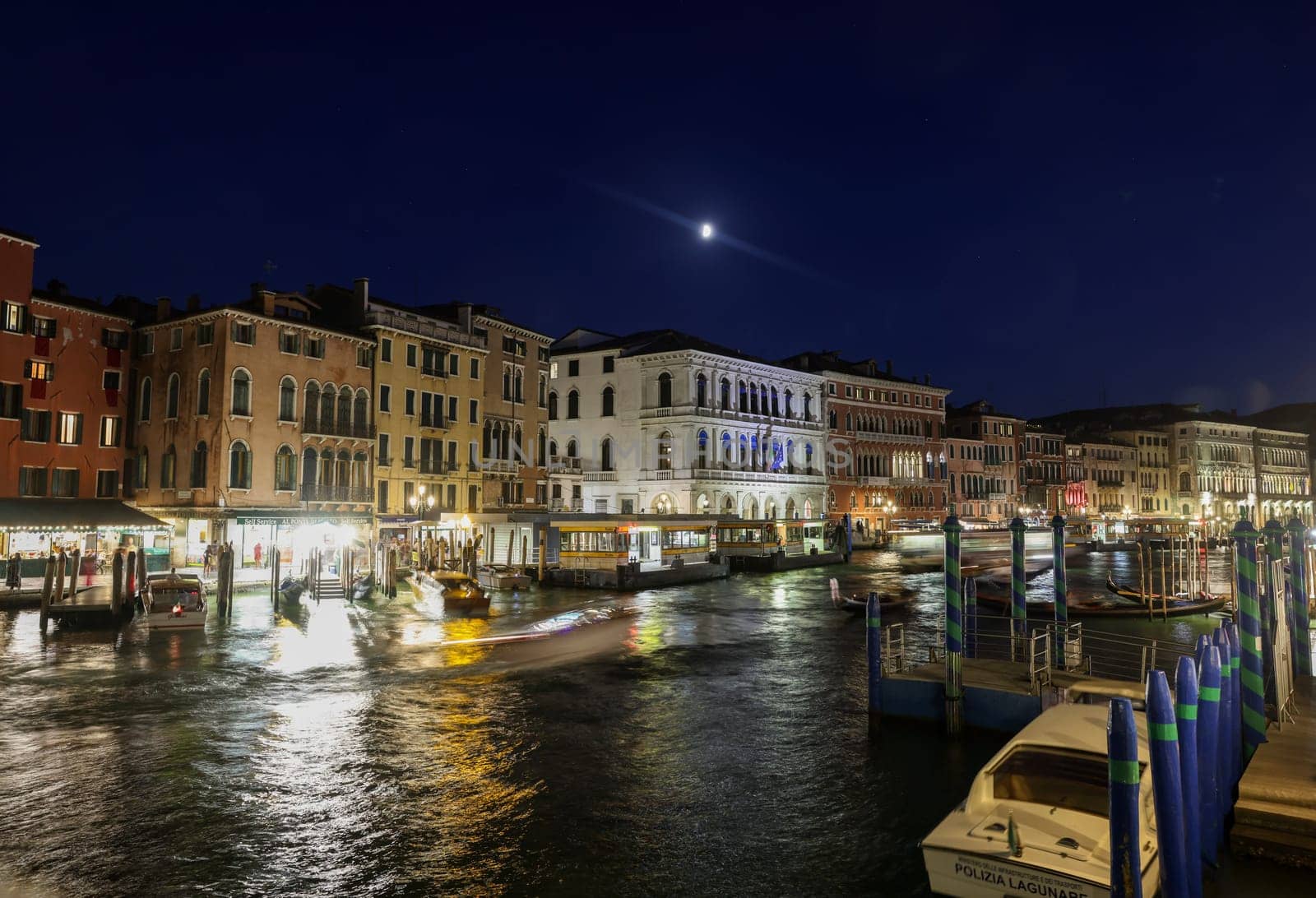 Venice, Italy - September 4, 2022: The Grand Canal near the Rialto Bridge at night