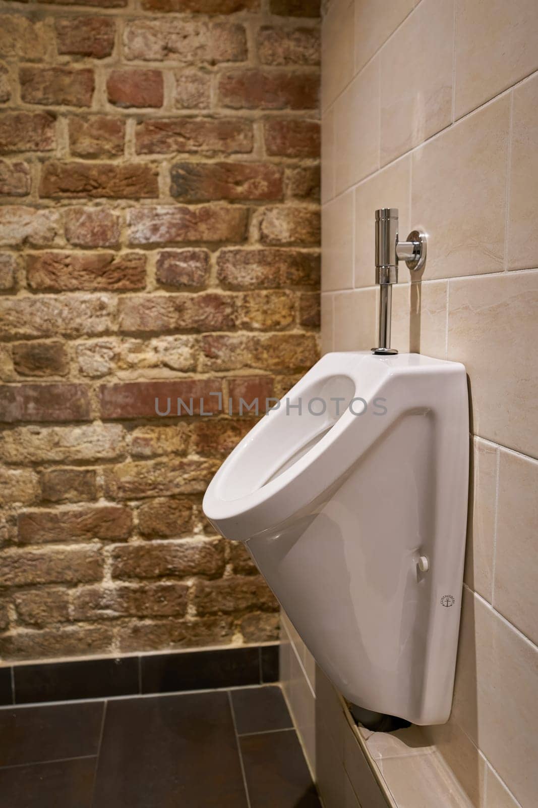 Urinal in a public toilet in the old town of Prague