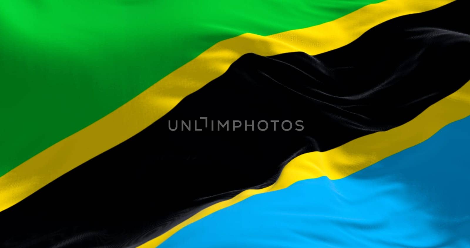 Close-up view of the Tanzania national flag waving. Green and blue triangles with black diagonal stripe and yellow edges. Fabric textured background. 3d illustration render