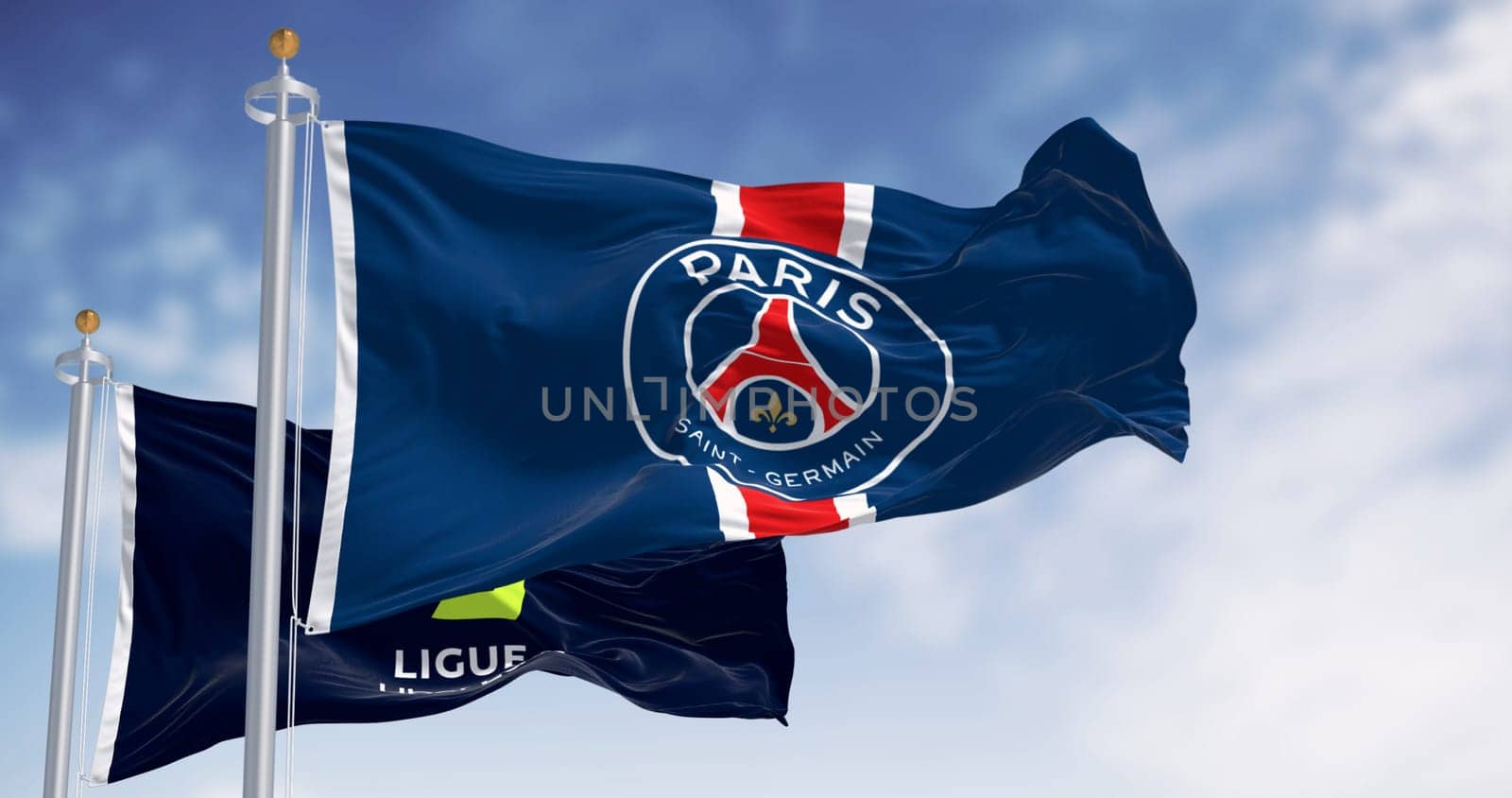 Paris, FR, dec 3 2023: Paris Saint Germain football club and Ligue 1 flags waving on a clear day. Illustrative editorial 3d illustration render. Selective focus