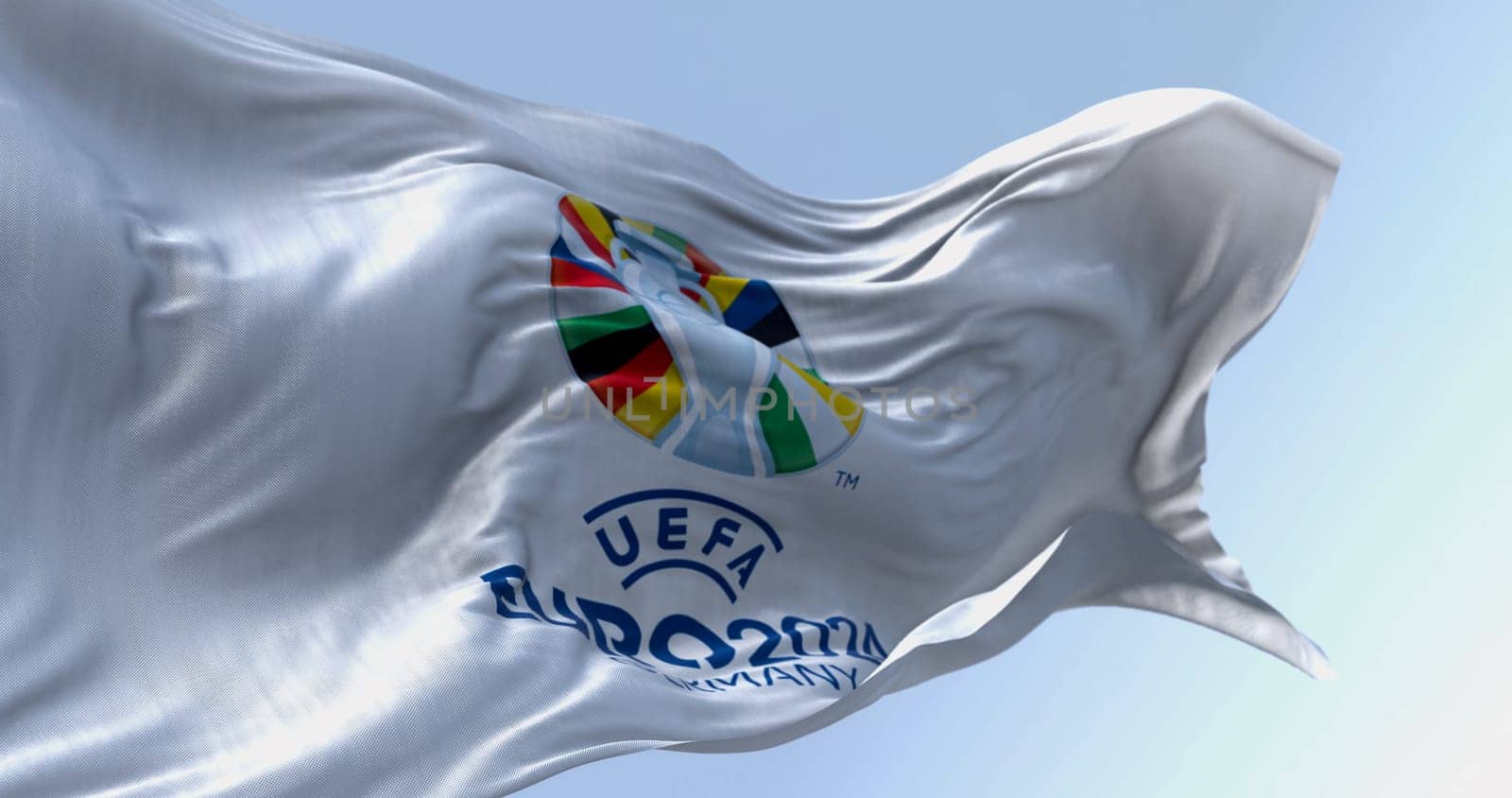 Berlin, DE, June 30 2023: UEFA Euro 2024 European Football Championship flag waving on a clear day. International Sport event. Illustrative editorial 3d illustration render