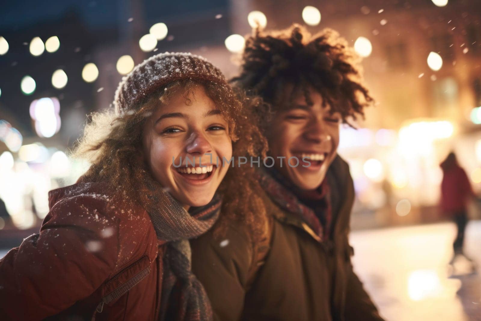 Happy couple of teenagers skating on ice on open rink. Having fun on winter holiday. Skaters enjoying winter holiday and ice skating. Sport and leisure on snow and ice. Snowy day. Wintertime. Winter activity