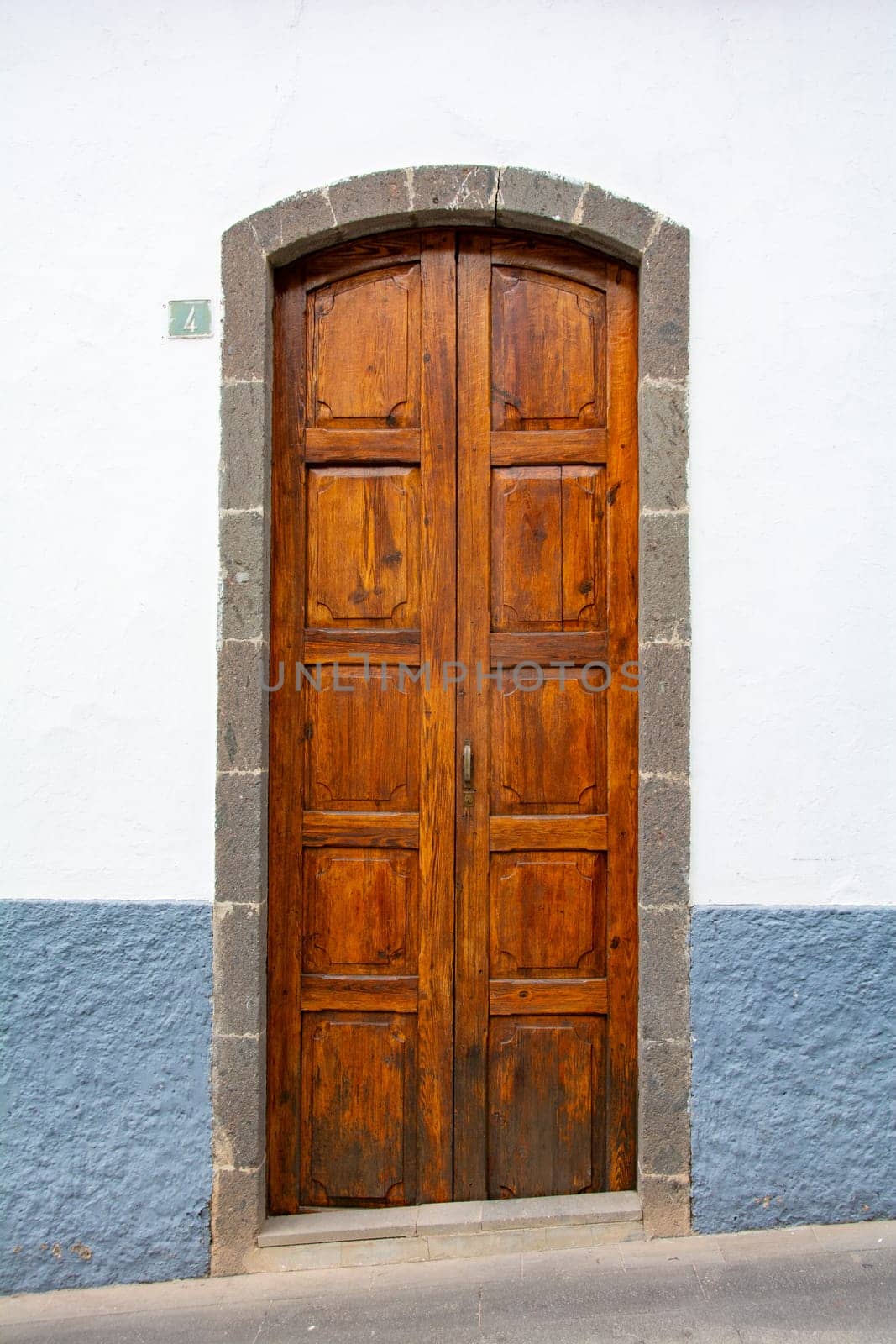 Old wooden door on a house on the Canary Island of Gran Canaria in Spain
