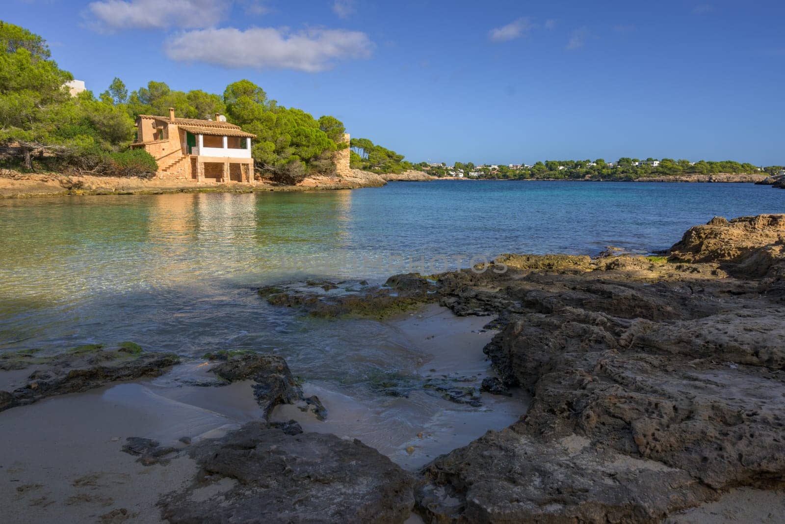 view of a small pier typical of the mediterranean beaches,