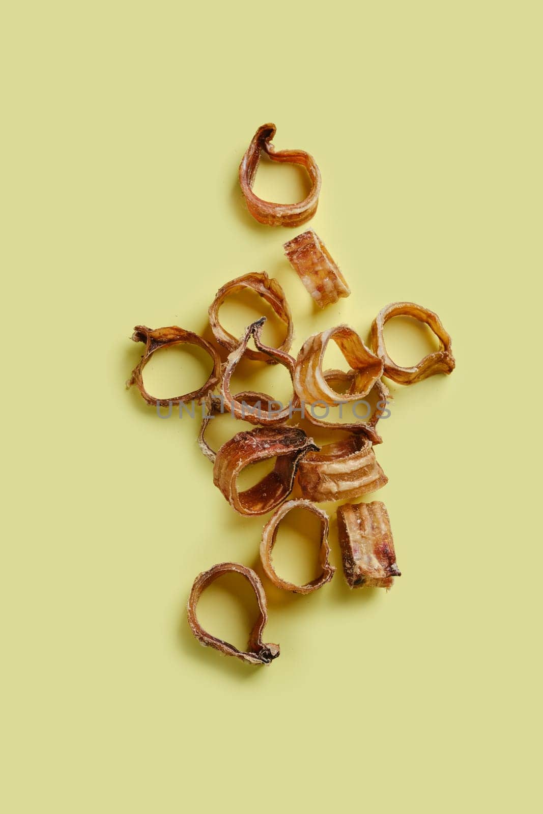 Top view of dehydrated organic beef throat cut on rings, reward for dogs
