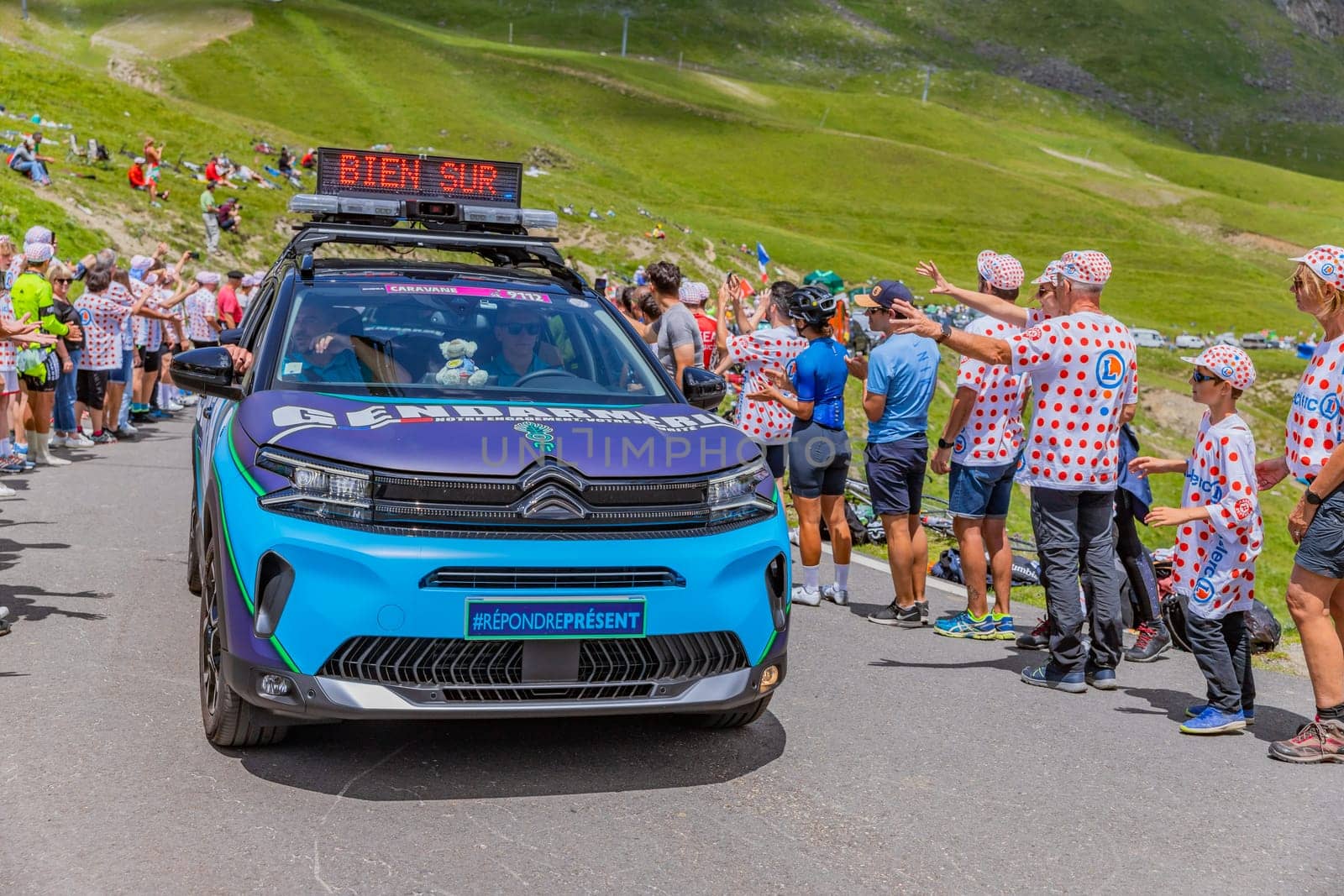Col du Tourmalet, France - July 06 2023: Caravan car at the top of the Col du Tourmalet in Pyerenees mountains during the stage 6 of Le Tour de France 2023