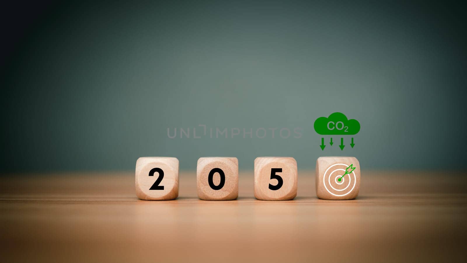 Wooden cubes with net zero icon in 2050 on wooden background, Net zero by 2050, Carbon neutral, Net zero green house gas emissions target, Climate neutral long term strategy, No toxic gases.