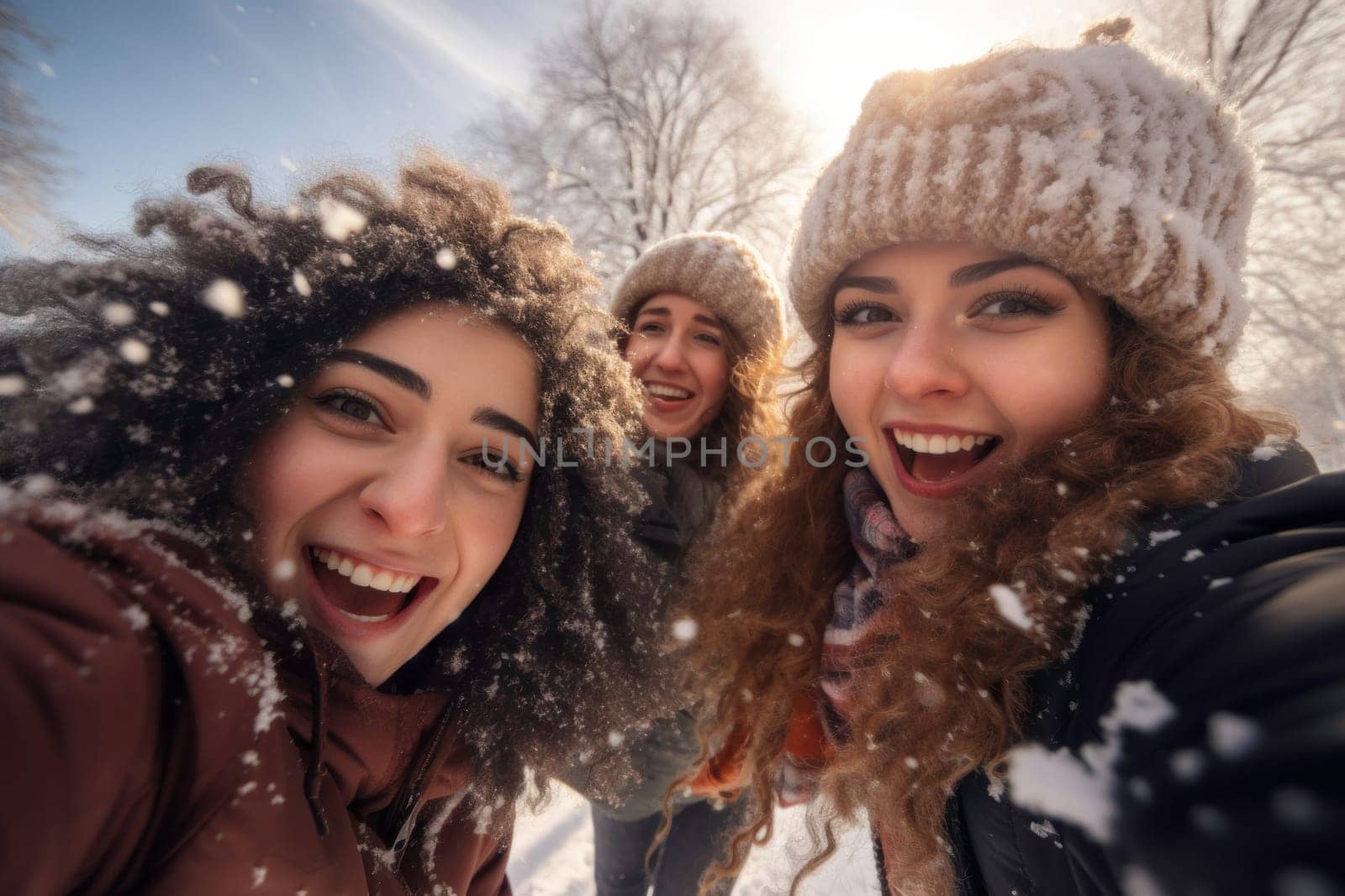 Excited children are joyfully playing in the snow, laughing and having fun. They engage in a friendly snowball fight with friends, taking selfie and creating cherished memories on their winter holiday. Positive and laughing, enjoying a snowy winter day
