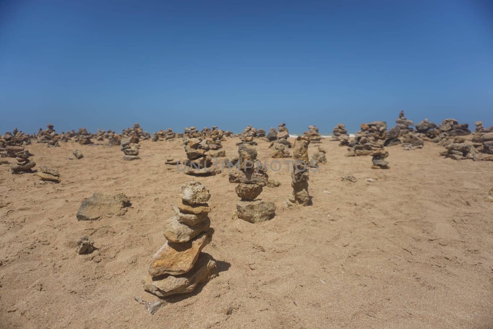 Man made stone piles at Punta Gallinas for good luck, La Guajira, Colombia 2020