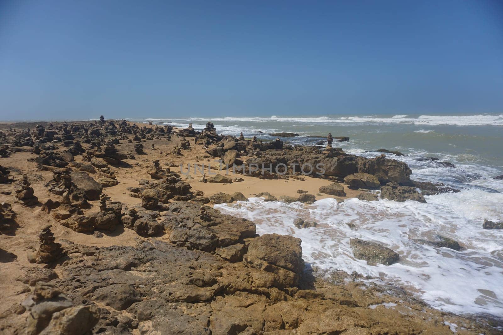 Stone pils build by visitors in Punta Gallinas, La Guajira, Colombia 2020