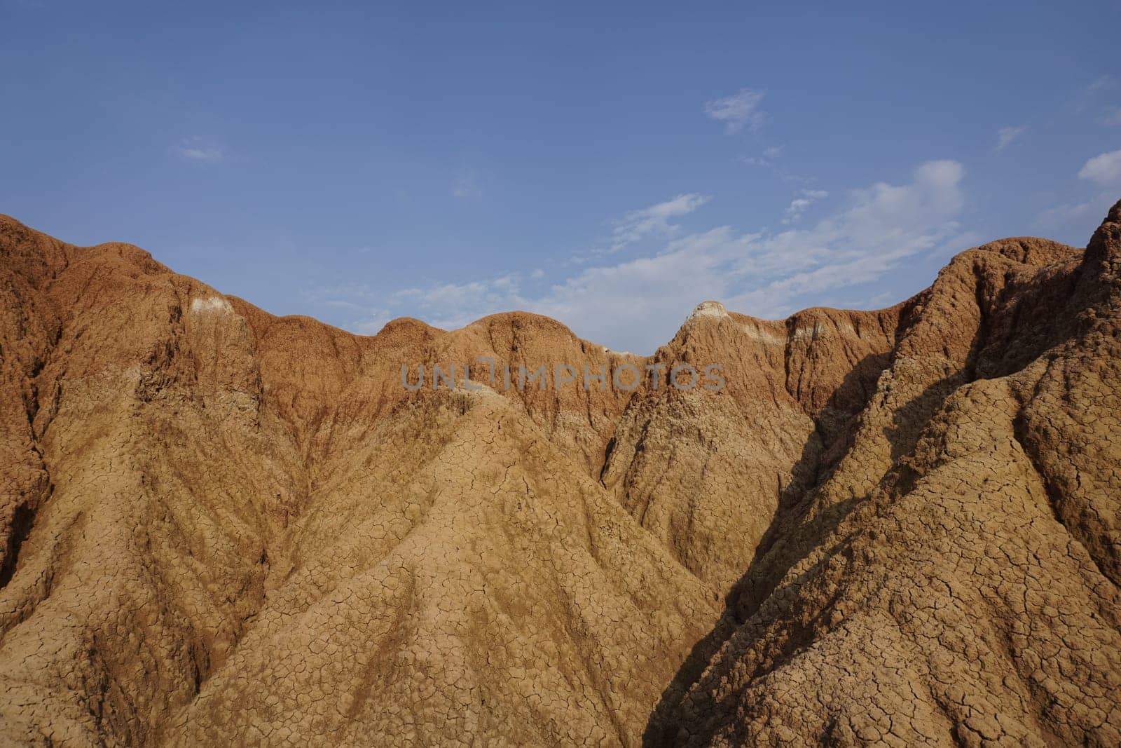 Red and yellow dried soil in the Tatacoa Desert, Desierto de la Tatacoa, eroded rock formations, Colombia 2020