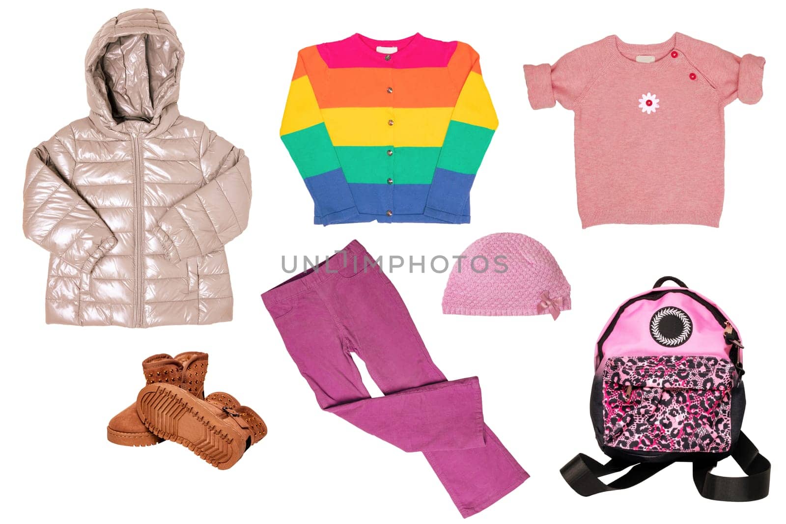 Collage set of little girl autumn or spring clothes isolated on white. Kids apparel collection. Childs fashion clothing outfit. Down jacket, sweater, boots, jeans, bag, cap.