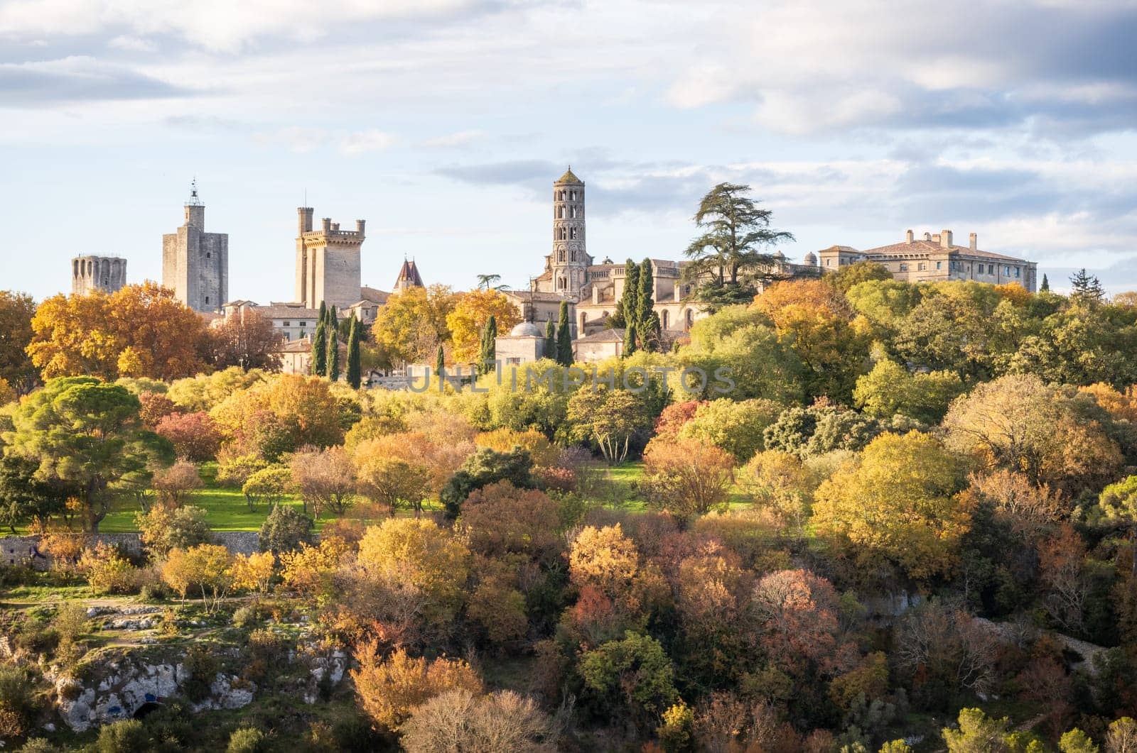 Uzès city of Art and History, general view in autumn. His 11th Century Tour Fenestrelle or Window Tower of the Cathedral of Saint Theodorit. Photography taken in Gard, France