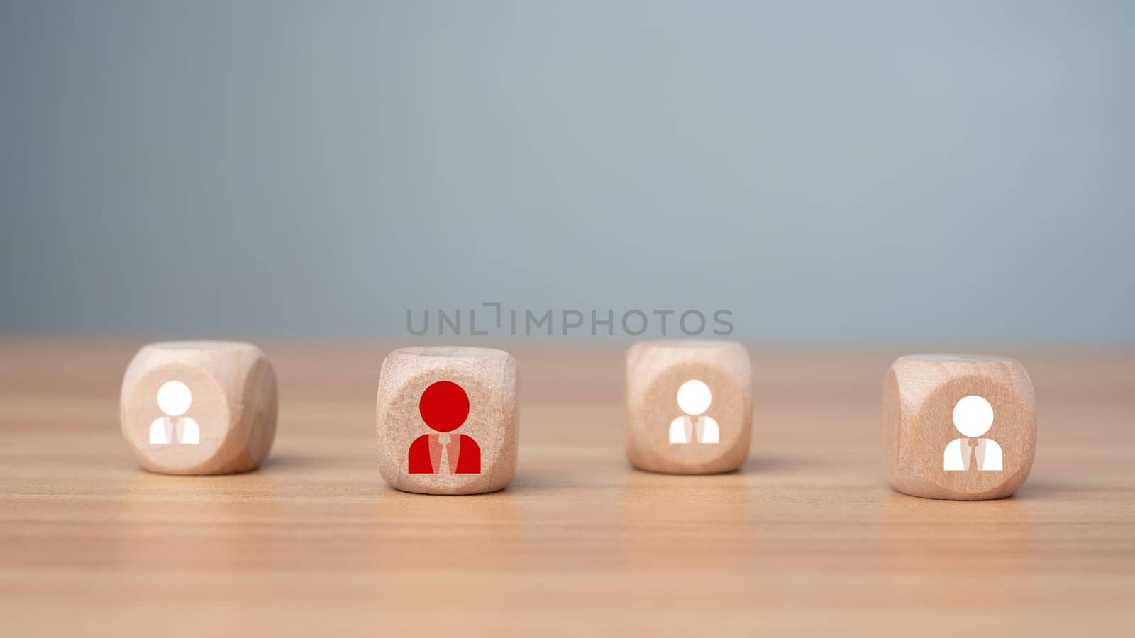 Wooden block printed icon of CRM concept representing business goal selection, target customers, marketing plan and strategy, customer centric strategy.