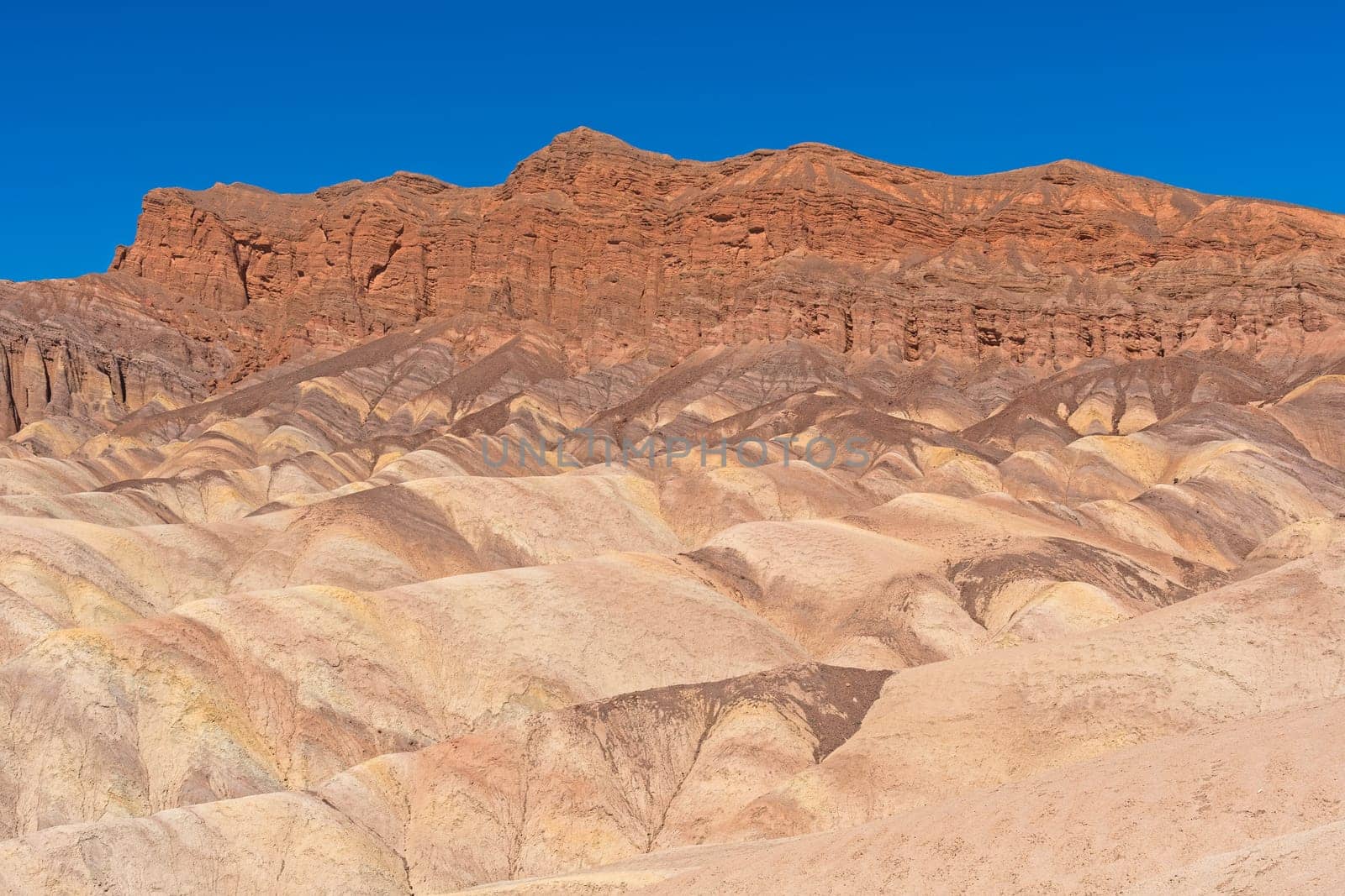 Spectacular Ridges Above Eroded Mineral Dunes at Zabriskie Point in Death Valley National Park in California