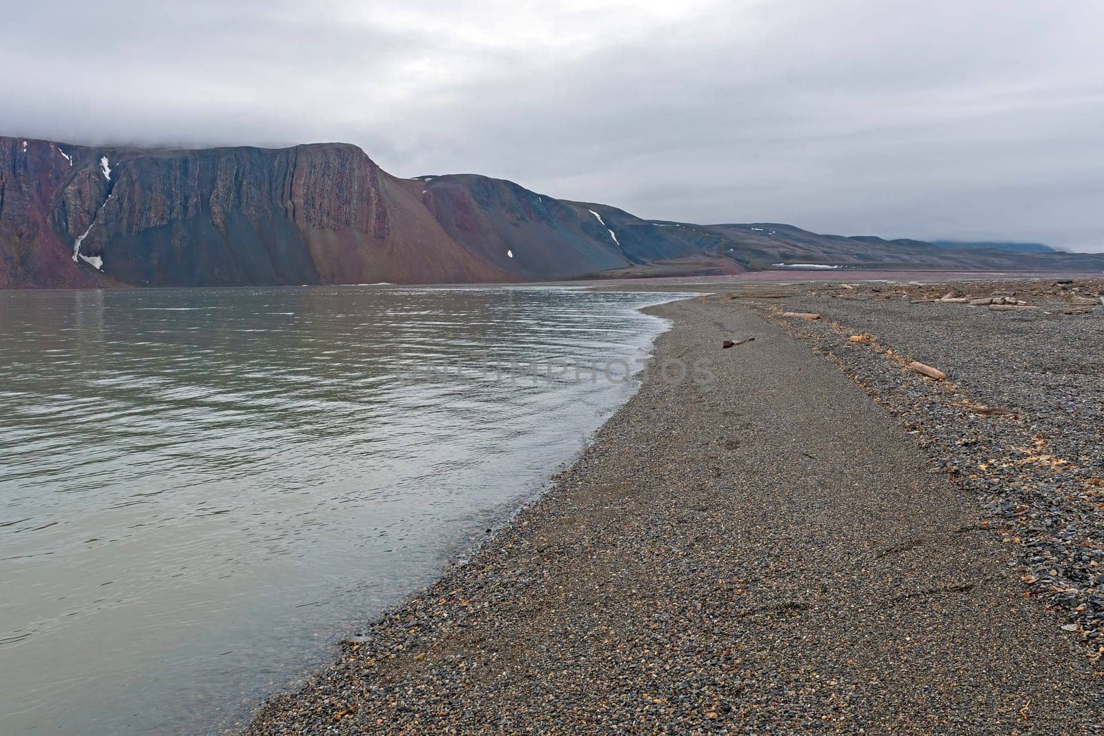 Quiet Gravel Beach on the High Arctic on Lomfjorden in the Svalbard Islands