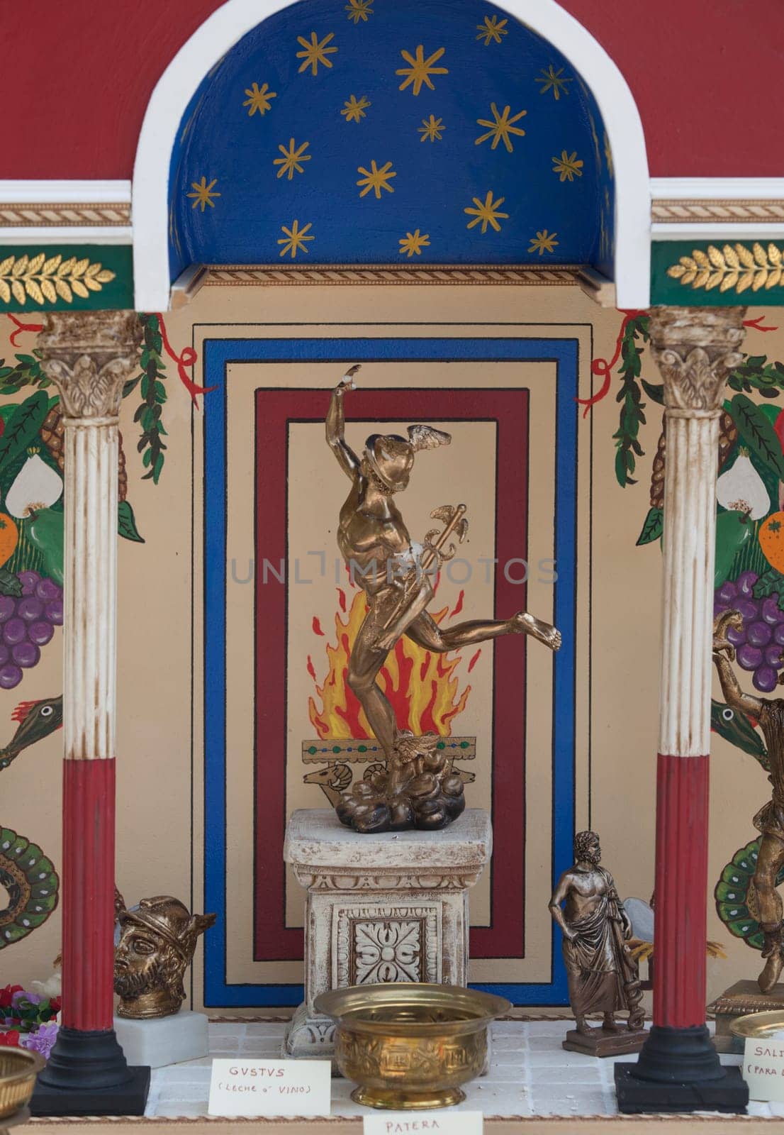 Merida, Spain - Oct 9th, 2021: Small roman altar with offerings. Emerita Ludica Festival 2021, Merida, Spain