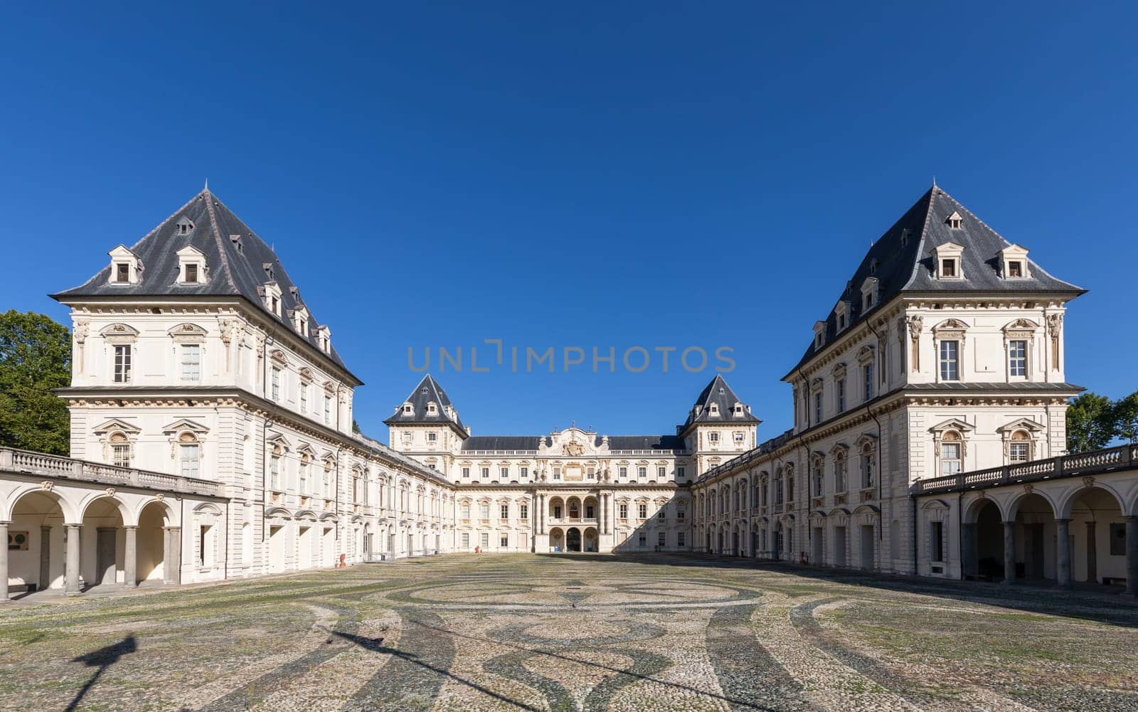 Turin, Italy - February 2023: castle exterior. Historical landmark with blue sky and daylight
