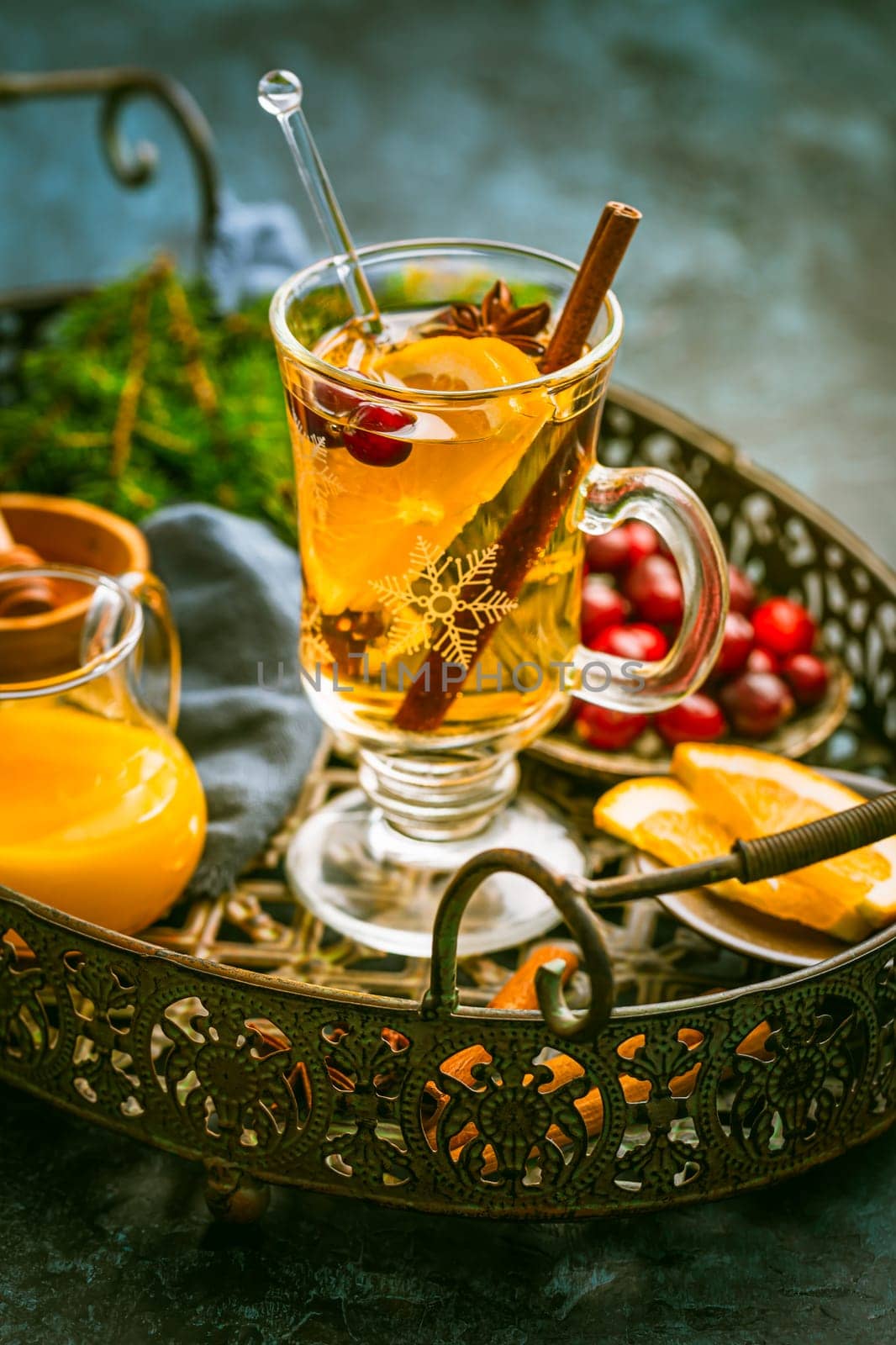 Delicious white mulled wine with orange, honey, cranberries and spices