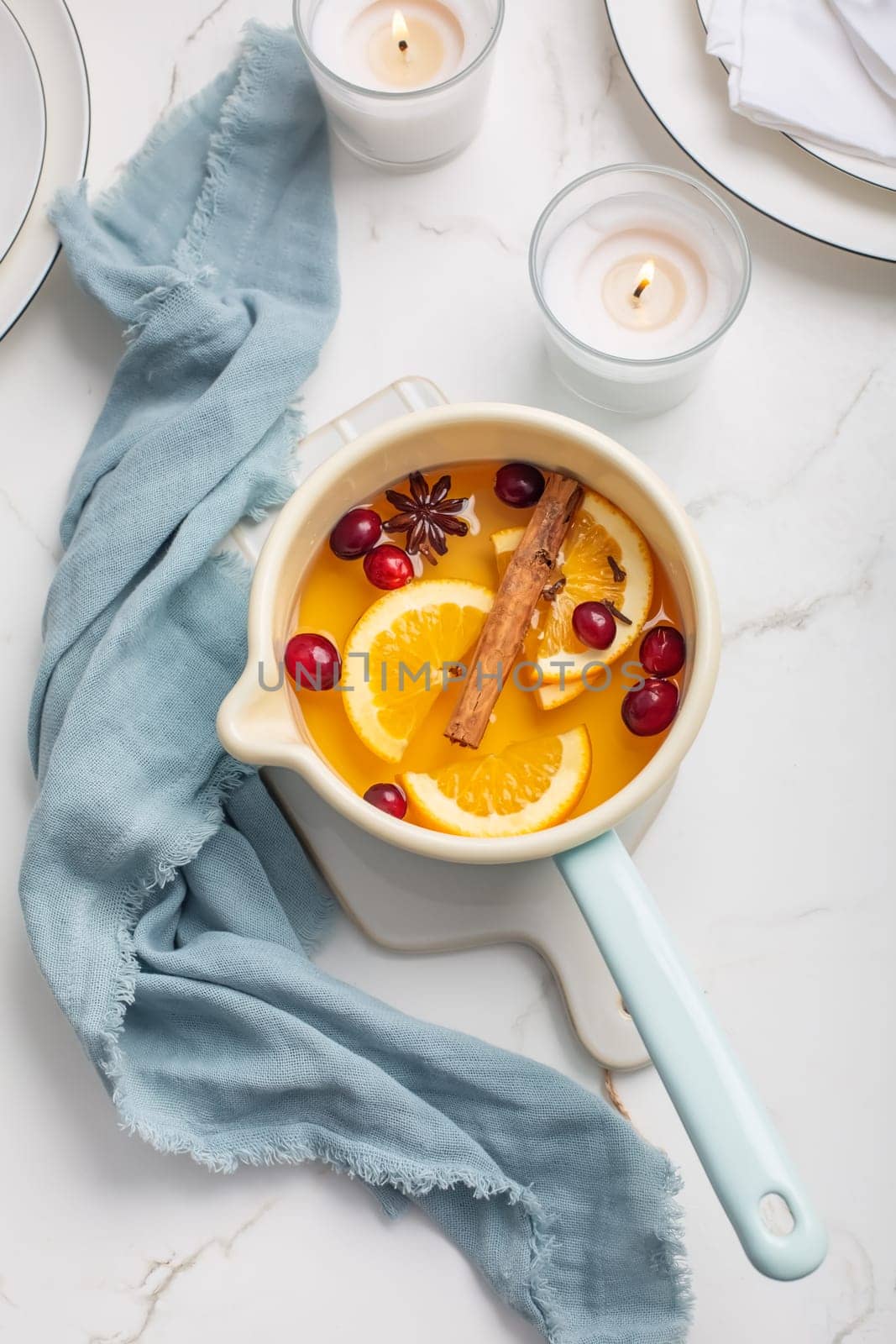 Delicious white mulled wine with honey, cranberries and spices