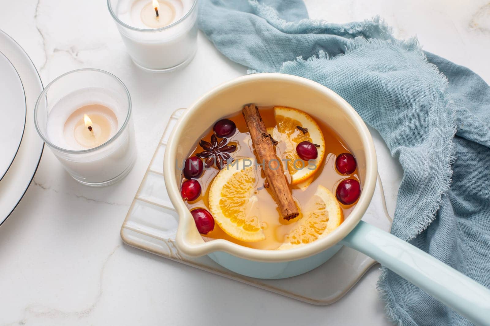 Delicious white mulled wine with honey, cranberries and spices