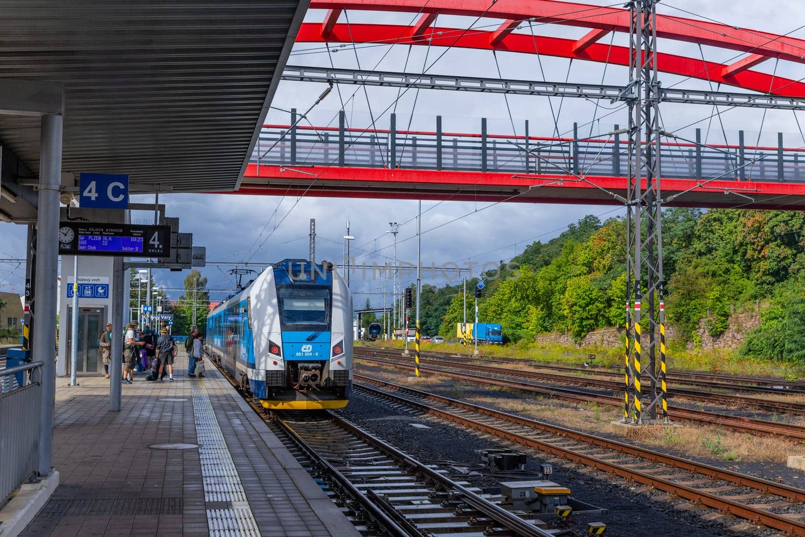 Karlovy vary, Czech Republic: August 09, 2023: View on platform of train station with people in Karlovy vary, Czech Republic.