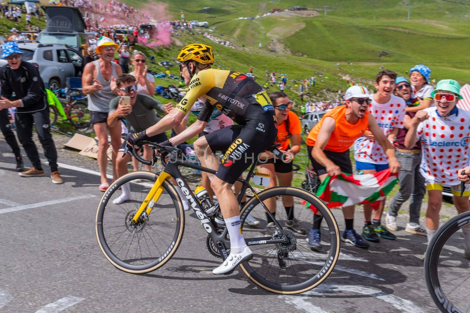 Col du Tourmalet, France - July 06 2023: Jonas Vingegaard climbig the road to Col du Tourmalet in Pyerenees mountains during the stage 6 of Le Tour de France 2023.