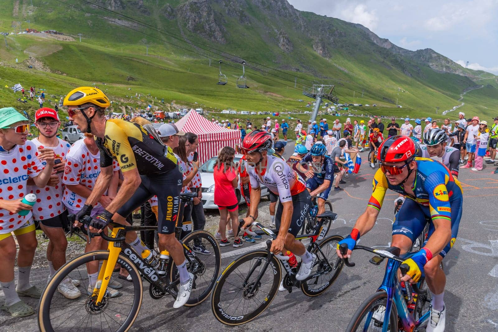 Col du Tourmalet, France - July 06 2023: Riders climbig the road to Col du Tourmalet in Pyerenees mountains during the stage 6 of Le Tour de France 2023.