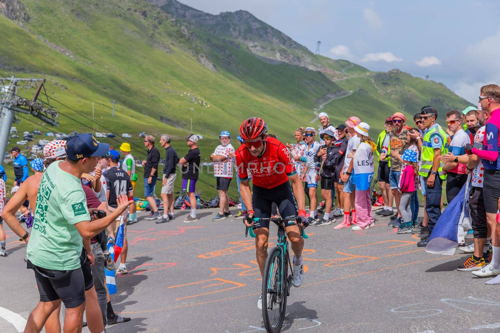 Col du Tourmalet, France - July 06 2023: Arkea Samsic rider climbig the road to Col du Tourmalet in Pyerenees mountains during the stage 6 of Le Tour de France 2023.