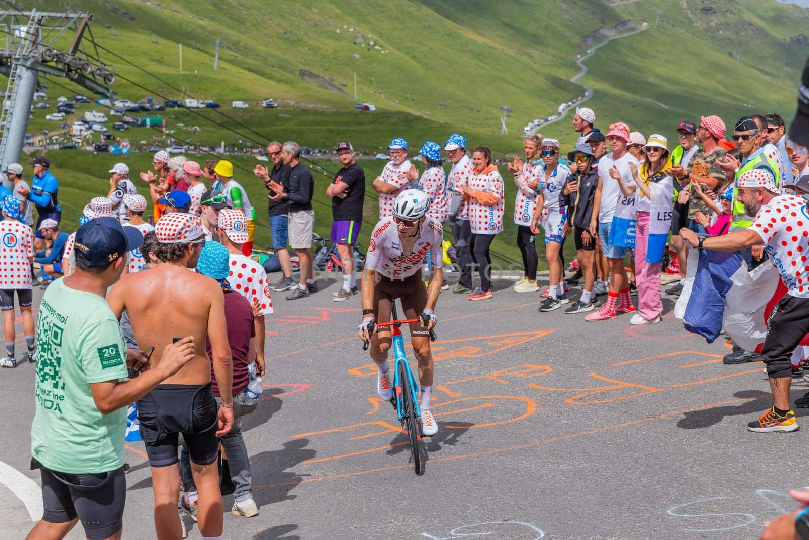 Col du Tourmalet, France - July 06 2023: Clement Berthet climbig the road to Col du Tourmalet in Pyerenees mountains during the stage 6 of Le Tour de France 2023.