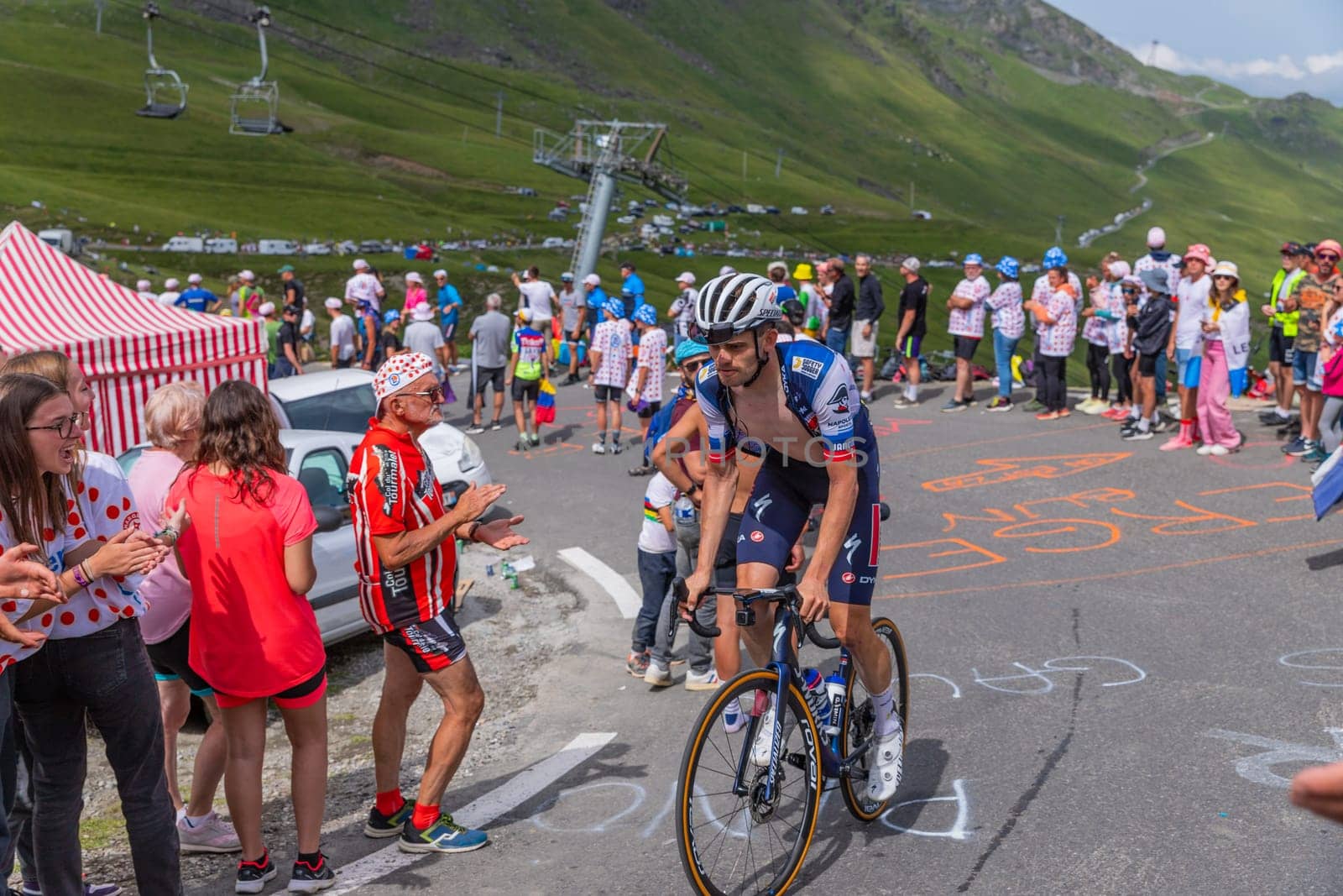 Col du Tourmalet, France - July 06 2023: Kasper Asgreen climbig the road to Col du Tourmalet in Pyerenees mountains during the stage 6 of Le Tour de France 2023.
