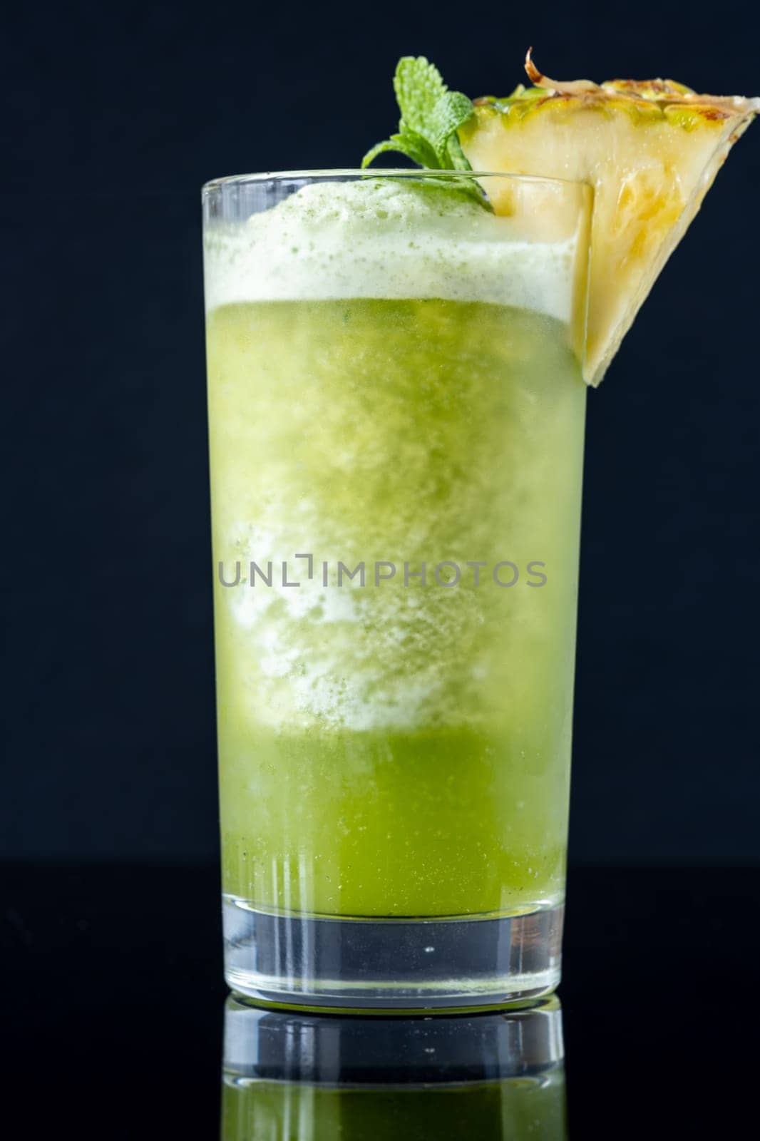 Missionary's Downfall cocktail garnished with pineapple wedge