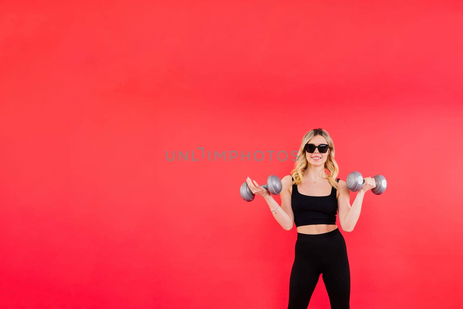 Woman, portrait and fitness, sunglasses and dumbbells, retro fashion accessory and muscle trainings